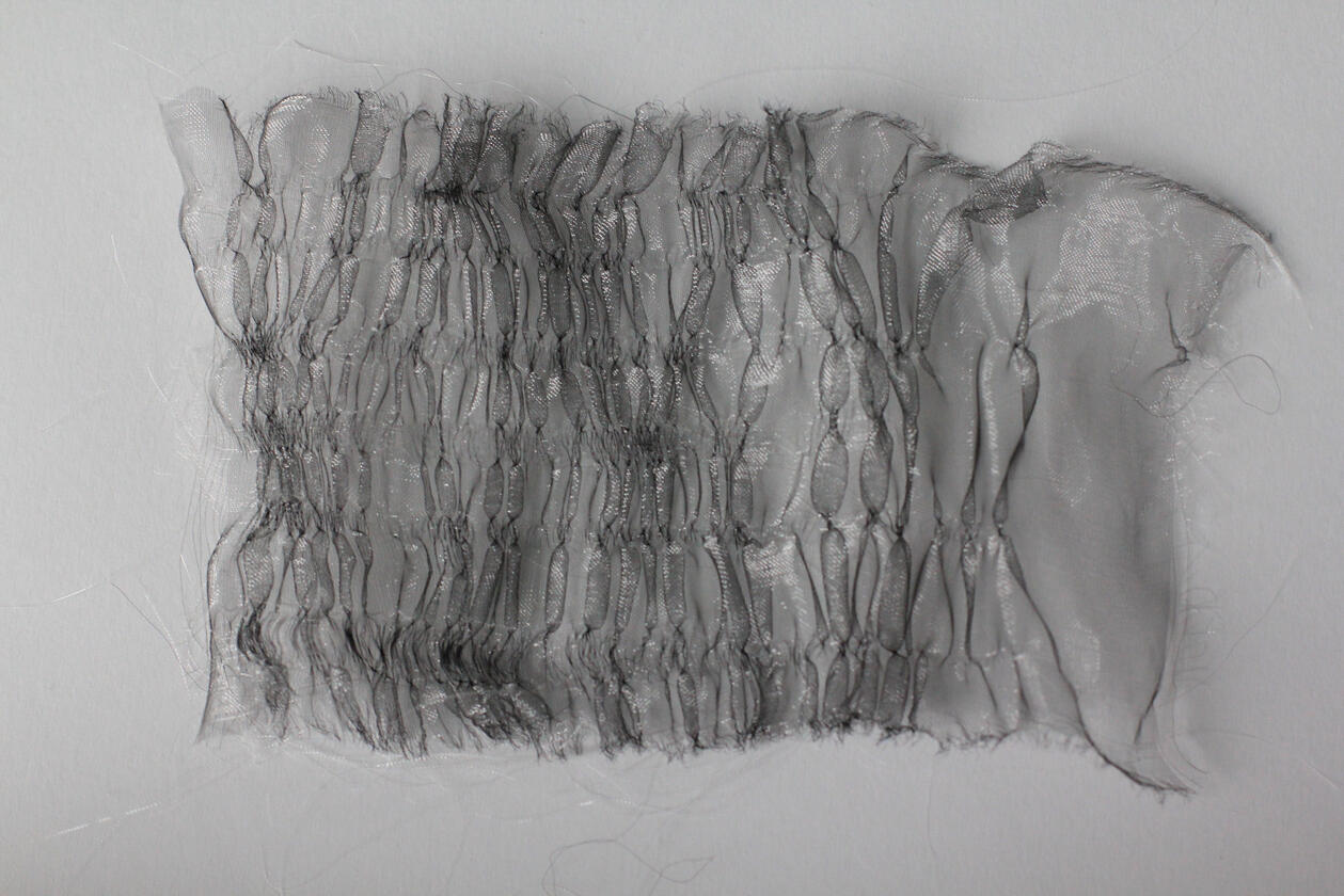 Transparent synthetic textile sample